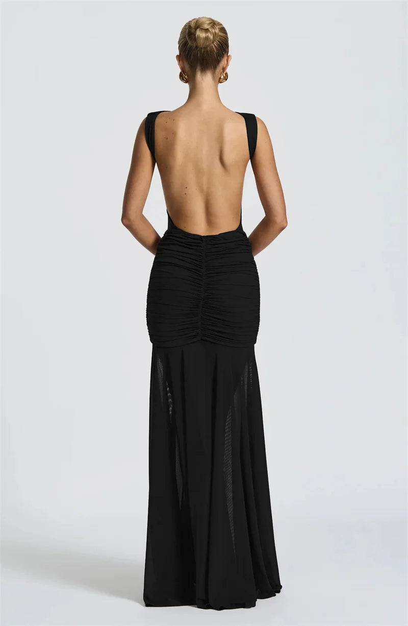 FLORIA - שמלת מקסי אלגנטית עם גב פתוח ועיטור פרח מתכתי בגזרה צמודה